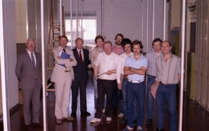 Photo:Executive Engineers Gordon Coward, John Whyte, Bert Luke, and Exchange Technical Officers Phil Comben and Alan Smith, with some of the Exchange Construction Engineers involved in the installation, testing, and transfer of the new TXE4 telephone exchange.