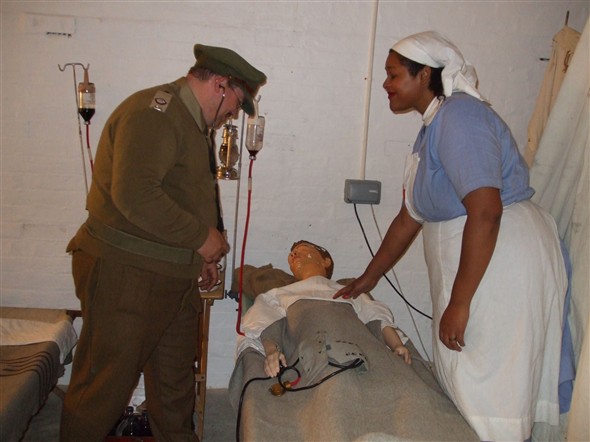 Photo:Captain Nick Walsh and Nurse Natasha Aiken from Crawley who were manning a recreated field hospital on the Dunkirk beach area which was set up in one of the forts tunnels.  Nick runs a living history unit which is a unit member of the "Great War Society" and a regular visitor to the Fort.