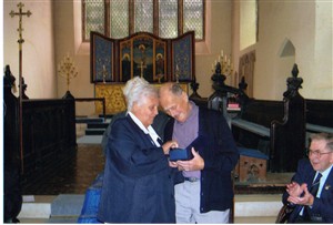 Photo:Jacques returning to Great Massingham in 2005, for the first time since 1943, to receive an engraved lead crystal plaque from the villagers of Great Massingham on behalf of all the Free French airman who flew from the village, as a token of gratitude for the efforts and sacrifice made by them towards winning the war in Europe.