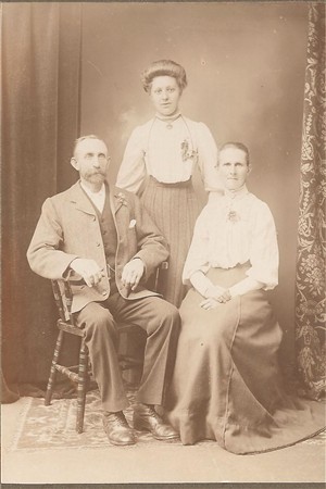 Photo:From left to right, Alfred Hills, daughter Lydia and his wife Sarah c1915