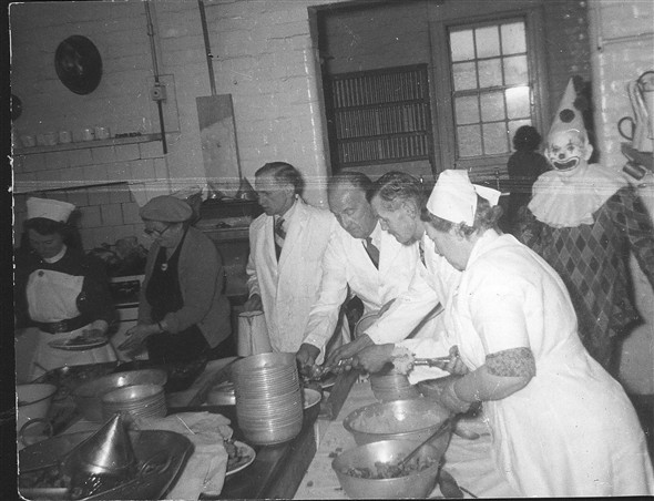 Photo:Serving Christmas dinner, c. 1952
