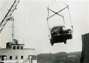 Photo:A Vauxhall Velox swings around while being loaded onto the Dieppe screw Brest at Newhaven in the late 1950s