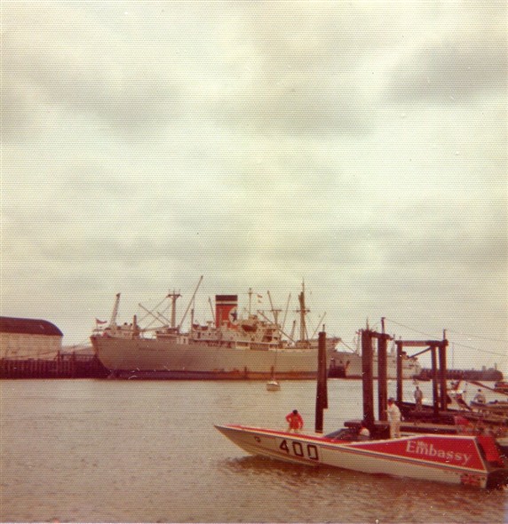 Photo:Moored at the pontoon in the marina, with a Blue Star Line freighter and a 'banana boat' (either 'Lempa' or 'Leon') moored behind at the Fishers Terminal on the East Quay