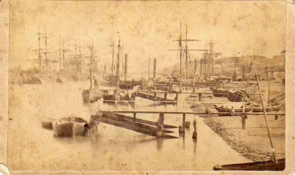 Photo:A very early photograph of then busy Harbour taken from the River Wall.