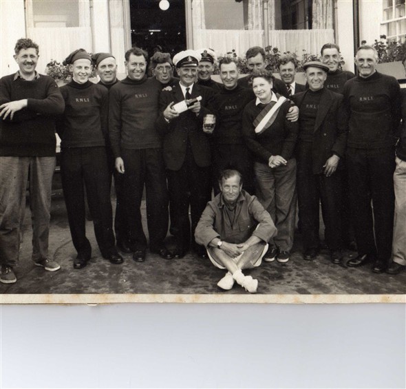 Photo:The crew;  left to right, 2nd left ; John Ingram-Reg Ingram-Edgar Moore-Steve Holden-Bill Harvey-Eric Page-Frank Vacher-Harold Moore-Ken Wood-George Stockwell-Charlie Ovenden-Bob Holden-Hym Schaverien. As the crew are all dressed in ceremonial uniform this photograph would have been taken after the christening of the Kathleen Mary before the uniforms were handed back to the R N L I, July 13th 1959.