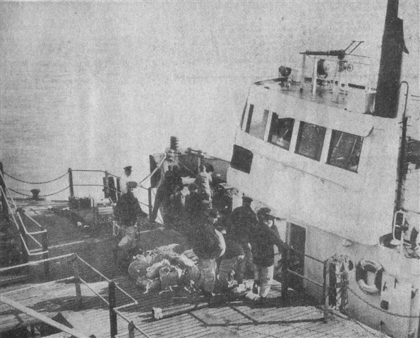 Photo:Firefighting equipment being loaded on board Dominant at Eastbourne Pier. You can see the high pressure water cannon on top of her wheelhouse. Meeching was similarly equipped.